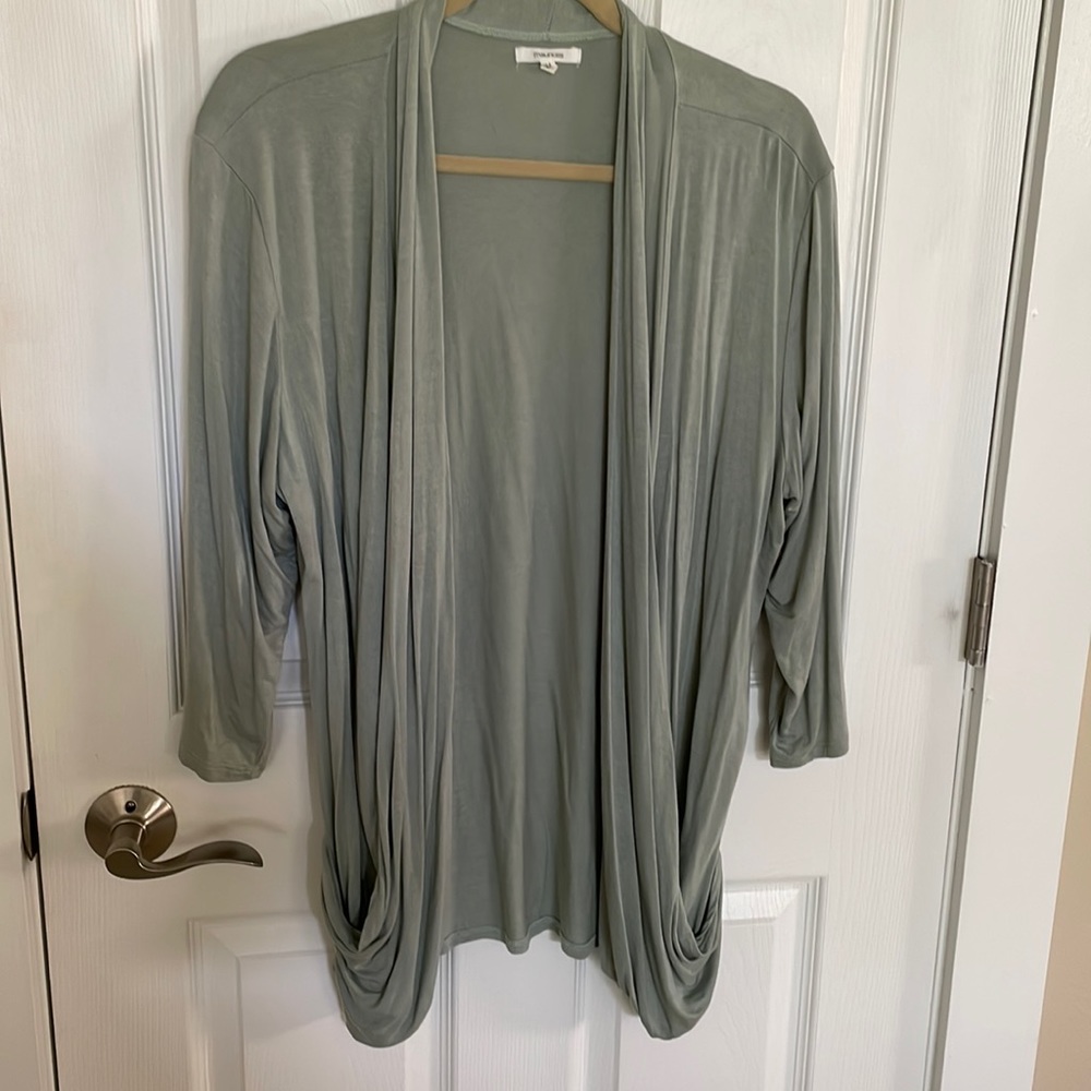 Maurice’s dusky green, size L, slouchy style with pockets. Worn once.